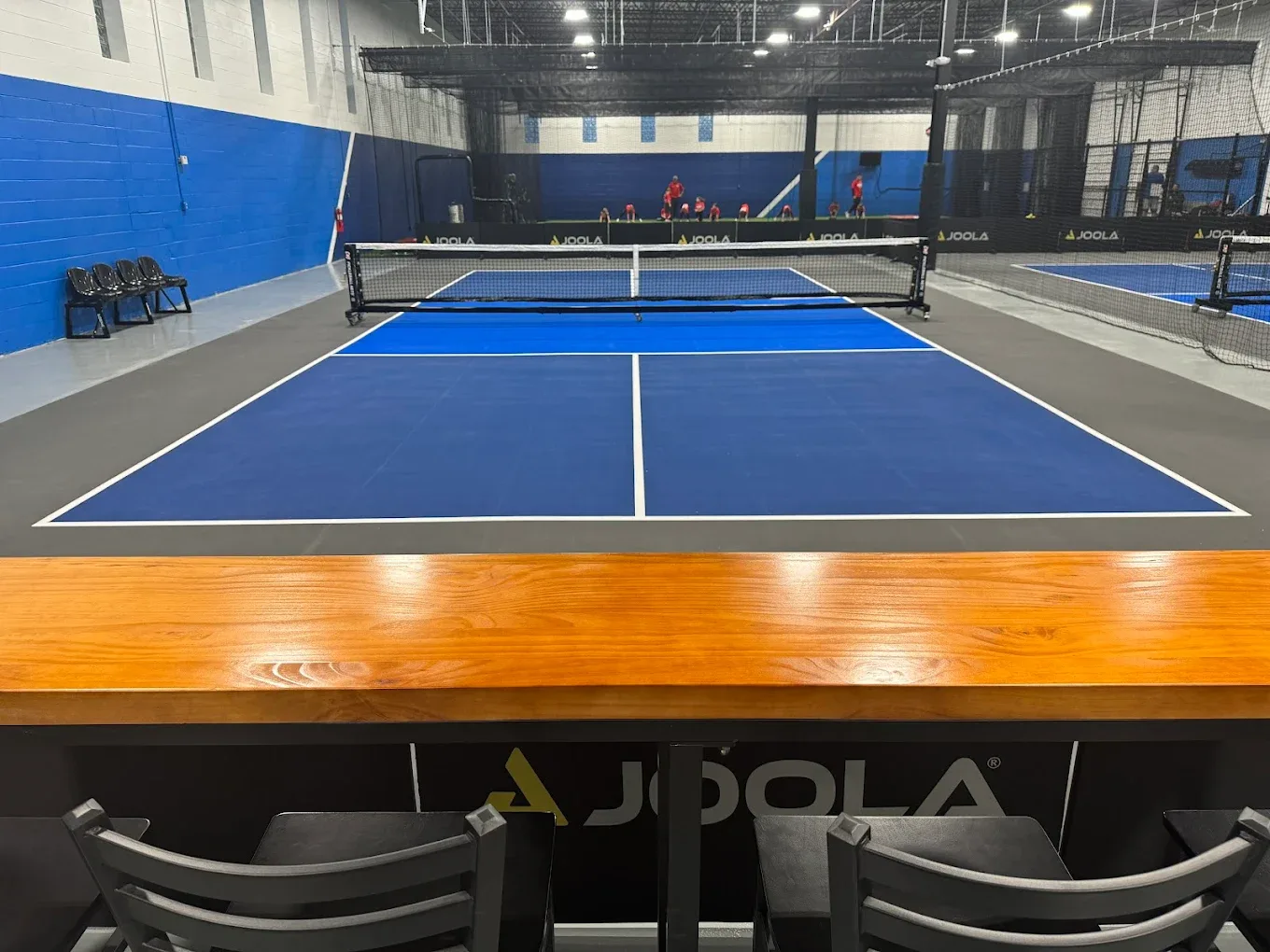 Pickleball court viewed from the lounge bar